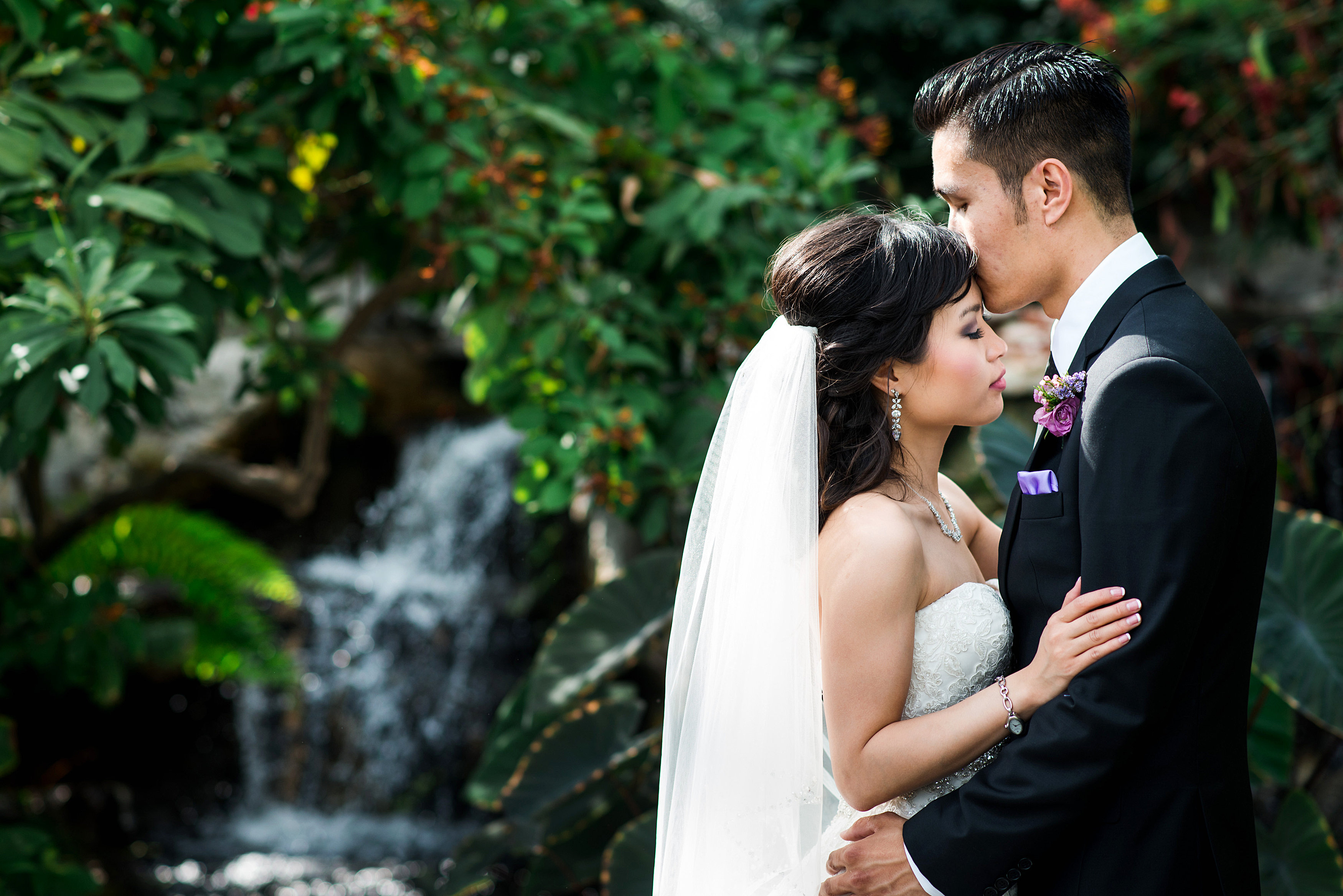 Bride and groom in the Conservatory by Ashley Fisher Photography