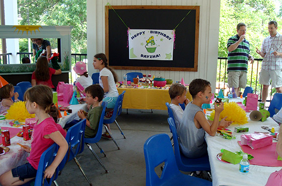 Party goers having cake