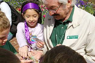 Volunteer educator with students