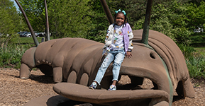 Girl on Caterpillar bridge