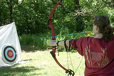 Woman practicing archery